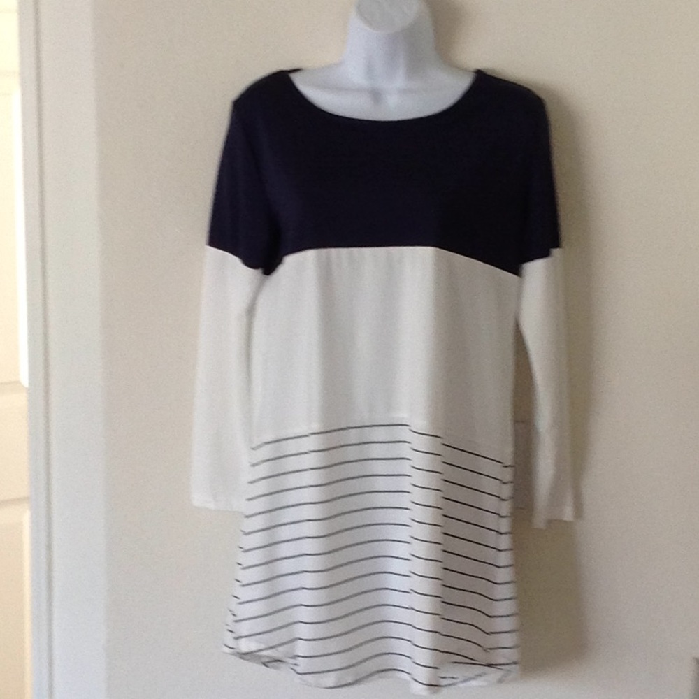 Navy/white top with layback lace detail. NWOT.